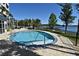 Inviting round in ground hot tub near the lake and condominium units at 13427 Blue Heron Beach Dr # 1802, Orlando, FL 32821