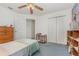 Bedroom with closet, ceiling fan, and empty room attached at 14325 Golden View Dr, Grand Island, FL 32735