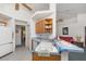 An open kitchen with light wood cabinets, a bar counter, and appliances at 14325 Golden View Dr, Grand Island, FL 32735