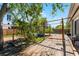 Beautiful backyard with a wooden deck, lush landscaping, and serene outdoor space at 1564 Cavendish Rd, Winter Park, FL 32789