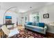 Spacious living area with access to the front entry, ideal for relaxing and enjoying natural light at 1564 Cavendish Rd, Winter Park, FL 32789