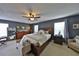 Main bedroom with neutral walls, plush carpet flooring, with natural light creating a cozy retreat at 1750 Morning Sky Dr, Winter Garden, FL 34787