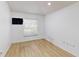 Bright bedroom featuring modern wood floors, neutral walls, and lots of natural light at 193 Lansbrook Ct, Ocoee, FL 34761