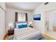 Comfortable bedroom with ample lighting, and ensuite bathroom at 193 Lansbrook Ct, Ocoee, FL 34761