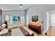 Comfortable main bedroom featuring stylish decor, ensuite bathroom, and a bright, airy feel at 193 Lansbrook Ct, Ocoee, FL 34761