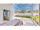 Screened in patio with picnic table, perfect for outdoor entertaining at 193 Lansbrook Ct, Ocoee, FL 34761