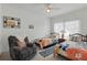 Inviting bedroom with two twin beds, decorative pillows, and a cozy sitting area at 20705 Nettleton St, Orlando, FL 32833
