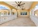Expansive balcony featuring decorative pillars and water views at 225 Magnolia St, Windermere, FL 34786