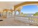 Stunning balcony featuring decorative pillars and railings with incredible water views at 225 Magnolia St, Windermere, FL 34786