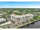 Beautiful aerial view of the condominium community, showcasing lush landscaping and waterfront location at 225 W Seminole Blvd # 409, Sanford, FL 32771