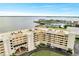 An aerial view of the condo building near the Manatee River and Twin Dolphin Marina at 225 W Seminole Blvd # 409, Sanford, FL 32771