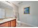 Cozy bathroom featuring granite countertops, and artwork at 225 W Seminole Blvd # 409, Sanford, FL 32771