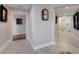 Bright hallway with marble floors leads to rooms with elegant decor and an antique grandfather clock at 225 W Seminole Blvd # 409, Sanford, FL 32771