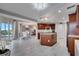 Open concept kitchen with rich wood cabinets, modern appliances, and a stylish layout for entertaining at 225 W Seminole Blvd # 409, Sanford, FL 32771