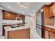 Kitchen with stainless steel appliances and granite countertops with center island at 225 W Seminole Blvd # 409, Sanford, FL 32771