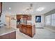 Elegant kitchen featuring a center island, stainless appliances, and sophisticated design elements throughout at 225 W Seminole Blvd # 409, Sanford, FL 32771