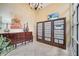 Mailroom with individual mailboxes, a modern chandelier, and adjacent side table at 225 W Seminole Blvd # 409, Sanford, FL 32771