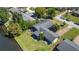 Aerial view showcases home's proximity to waterway, the lawn size and mature trees at 2601 Windward Ct, Orlando, FL 32805