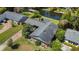 Aerial view of home showcasing the backyard, nearby waterway, and meticulous landscaping at 2601 Windward Ct, Orlando, FL 32805