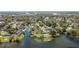 Scenic aerial view of canal-front homes with docks, perfect for boating enthusiasts at 2601 Windward Ct, Orlando, FL 32805