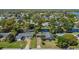 Waterfront homes with lush landscaping line tranquil canals, offering serene residential living at 2601 Windward Ct, Orlando, FL 32805