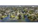 Aerial view of waterfront homes on canals offering boating access and tranquil living at 2601 Windward Ct, Orlando, FL 32805