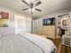 Bedroom with closet, ceiling fan, and view to ensuite bathroom at 2601 Windward Ct, Orlando, FL 32805