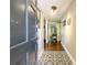Welcoming foyer with modern black and white tiles leading into a bright, open space at 2601 Windward Ct, Orlando, FL 32805