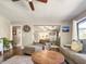 Living room showcasing an open layout with hardwood floors, neutral colors and lots of natural light at 2601 Windward Ct, Orlando, FL 32805