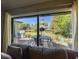 Living room view to outdoor patio and water, showcasing an inviting entertainment area at 2601 Windward Ct, Orlando, FL 32805