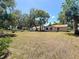 Large, grassy backyard offering ample space for recreation and outdoor activities at 2617 S Marshall Ave, Sanford, FL 32773