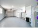 Spacious two-car garage with painted walls, concrete floor, and water heater at 2617 S Marshall Ave, Sanford, FL 32773