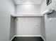 The room has a gray interior with painted walls, black flooring, and light trim at 2617 S Marshall Ave, Sanford, FL 32773