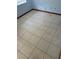 Simple bedroom with neutral walls and tile flooring with exposed wiring at 2618 Adela Ave, Orlando, FL 32826
