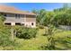 Fenced backyard with lush greenery at 3149 Scrub Oak Trl, Oviedo, FL 32765