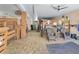 Horse barn with ceiling fan, horse inside stall, and seating area at 3149 Scrub Oak Trl, Oviedo, FL 32765