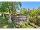 Equestrian area with classic statues, a gated entrance, and a well-maintained paddock for horses at 3149 Scrub Oak Trl, Oviedo, FL 32765