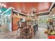 Bright kitchen with custom cabinetry, stainless appliances, and a large kitchen island with barstool seating at 3149 Scrub Oak Trl, Oviedo, FL 32765