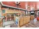 View of the spacious kitchen featuring a large island and workspace, bathed in vibrant color at 3149 Scrub Oak Trl, Oviedo, FL 32765