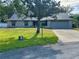 Charming single-Gathering home with a well-maintained lawn and mature tree in a serene neighborhood at 324 Bonita Rd, Debary, FL 32713