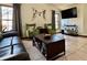 Bright living room featuring vaulted ceilings, tile floors, and modern decor at 324 Bonita Rd, Debary, FL 32713
