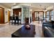 Open-concept living space with breakfast bar, dining nook, and comfortable seating at 324 Bonita Rd, Debary, FL 32713