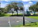 Outdoor basketball court and playground near the lake create a fun recreational space for the community at 400 Royal Palm Ct, Longwood, FL 32779