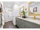 Elegant bathroom with double vanities, stylish mirrors, and modern fixtures at 400 Royal Palm Ct, Longwood, FL 32779
