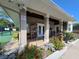 Charming clubhouse with manicured landscaping, offering a welcoming community gathering space at 400 Royal Palm Ct, Longwood, FL 32779
