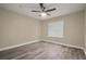 Cozy bedroom with ample natural light and neutral décor, perfect for relaxation at 404 Summit Ridge Pl # 110, Longwood, FL 32779