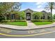 Inviting clubhouse exterior with lush landscaping and convenient parking at 404 Summit Ridge Pl # 110, Longwood, FL 32779