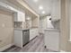 Functional kitchen with stainless steel dishwasher, sink, and granite countertops at 404 Summit Ridge Pl # 110, Longwood, FL 32779