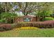 A welcoming entrance sign for Sabal Point surrounded by colorful flowers and landscaping at 404 Summit Ridge Pl # 110, Longwood, FL 32779