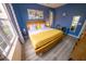 Inviting bedroom with large windows, stylish decor and functional workstation at 4720 Hemingway House St, Kissimmee, FL 34746